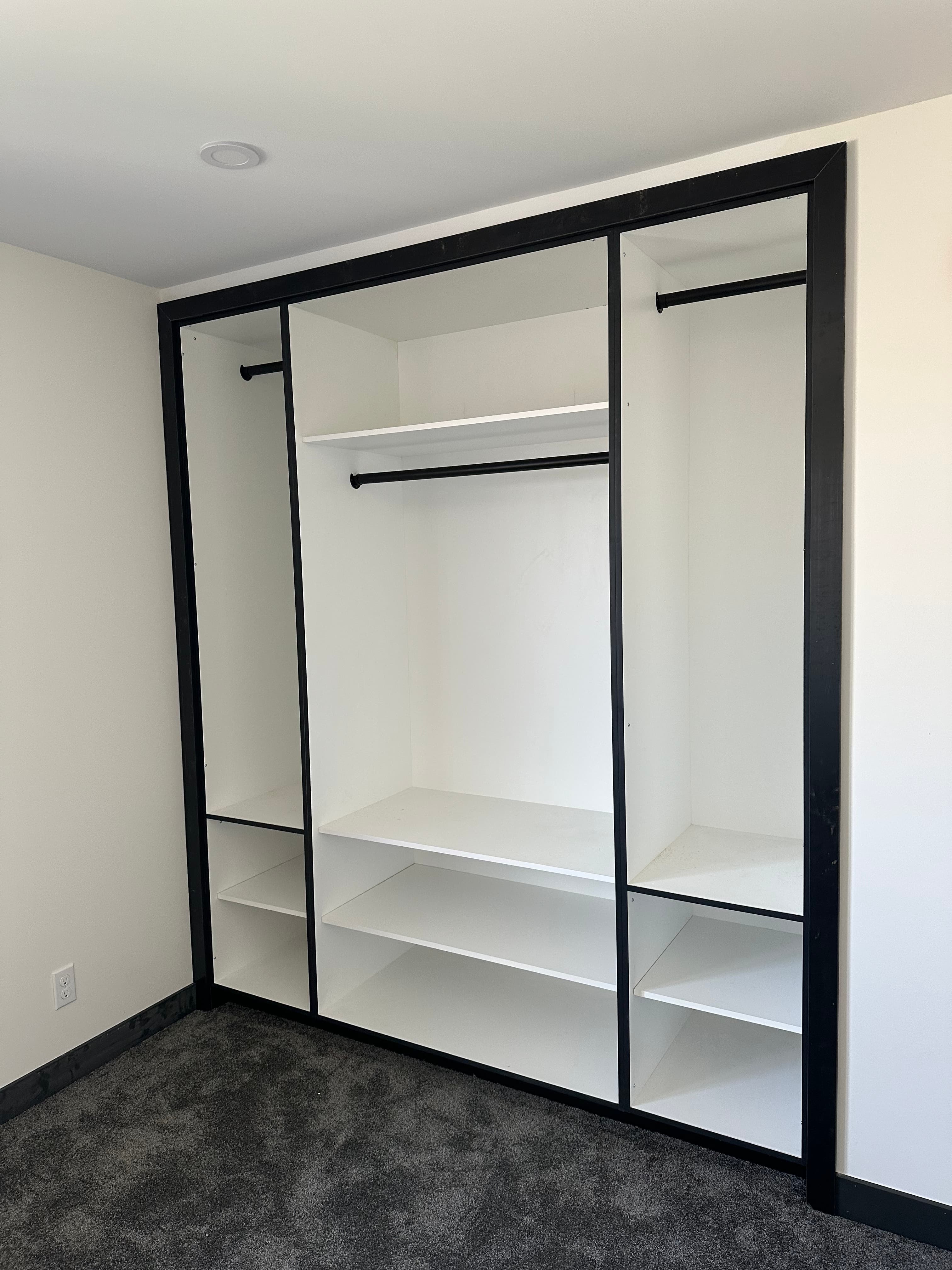Custom walk-in closet installed in Winnipeg by Takura Homes